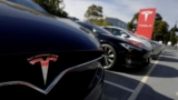 Tesla owners sue, say software updates cut range by 20%, break batteries